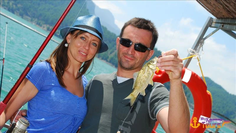 Picnic and fishing on the lake Karacaören Kemer